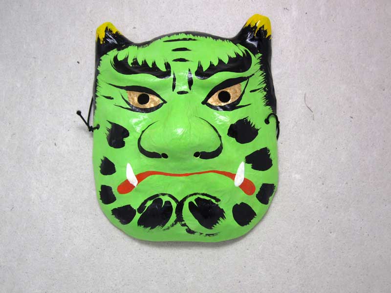 Green devil mask.