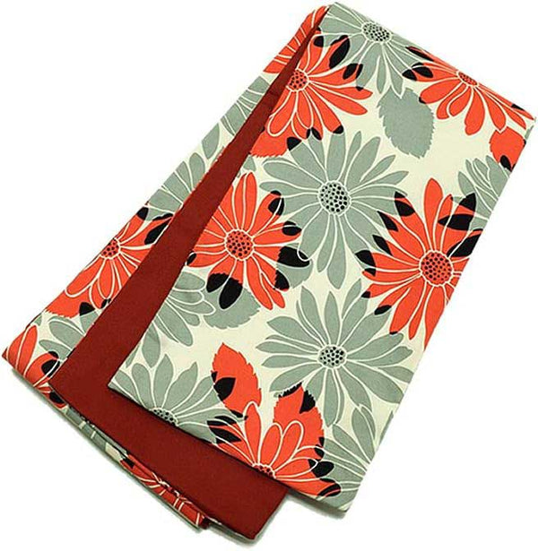 Colorful obi with floral design.